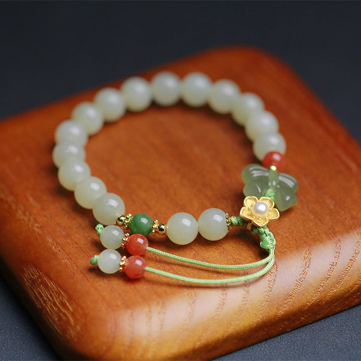 Bracelet Buddha Stones en argent sterling 925 et jade avec fleur porte-bonheur et papillon