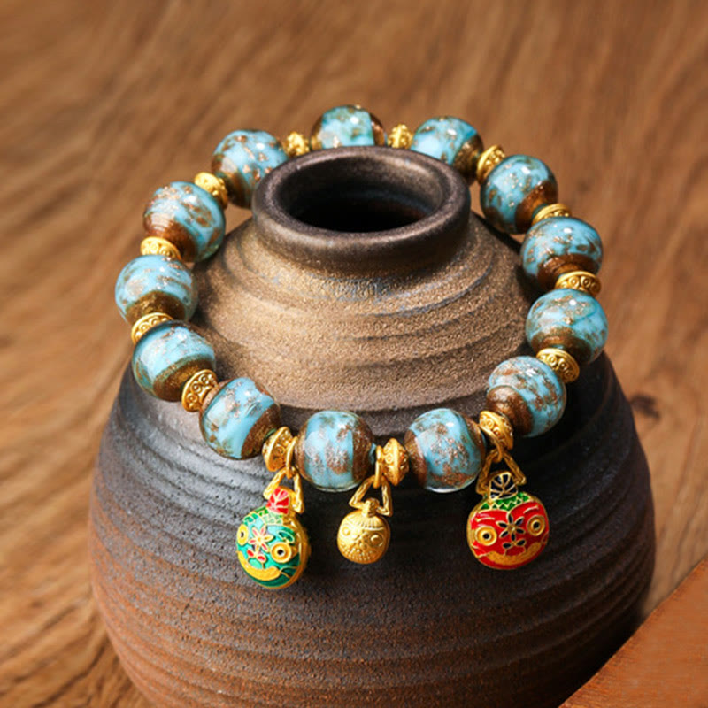 Bracelet porte-bonheur en perles de verre Liuli avec breloque de la famille des bêtes avaleuses en or et Buddha Stones