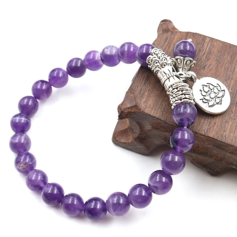 Bracelet d'équilibre et de guérison en cristal d'améthyste et de lotus en Buddha Stones