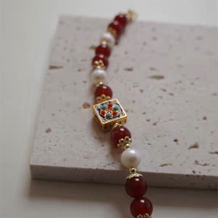 Bracelet de confiance en soi et d'acceptation de soi en perles d'agate rouge de Buddha Stones