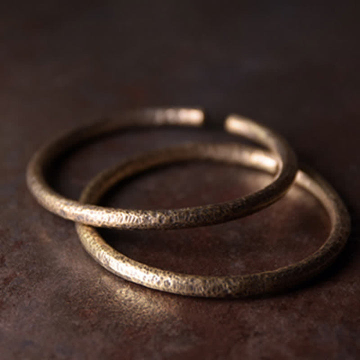 Bracelet manchette ajustable en cuivre au design rustique avec Buddha Stones