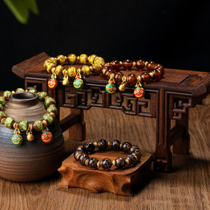 Bracelet porte-bonheur en perles de verre Liuli avec breloque de la famille des bêtes avaleuses en or et Buddha Stones