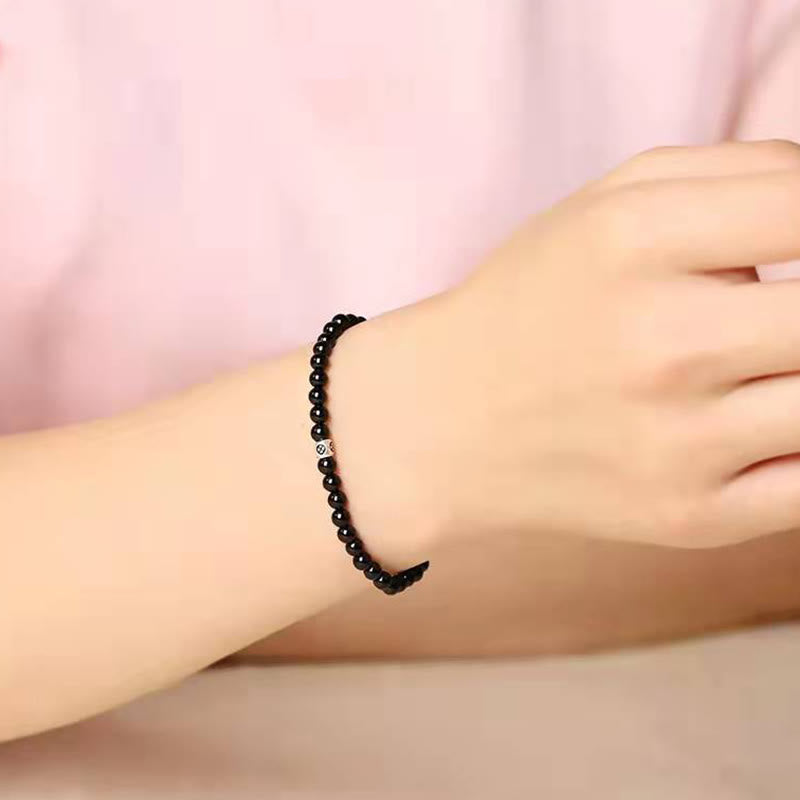 Bracelet de force de purification en obsidienne noire naturelle et quartz fumé de Buddha Stones