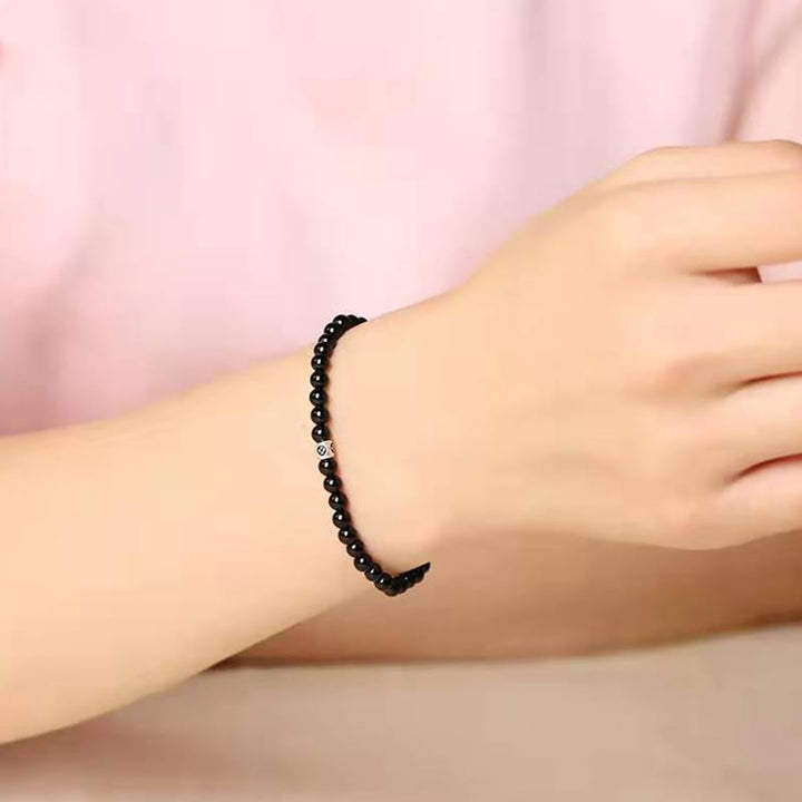 Bracelet de force de purification en obsidienne noire naturelle et quartz fumé de Buddha Stones