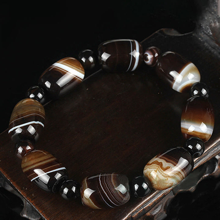 Bracelet de courage et de bonheur en sardonyx naturel Buddha Stones