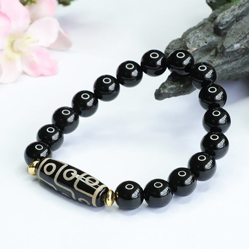 Bracelet de puissance tibétain en onyx noir avec perles dzi à neuf yeux et Buddha Stones