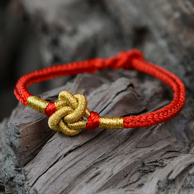 Bracelet tressé fait main avec un design simple et des nœuds chinois pour la force et la chance
