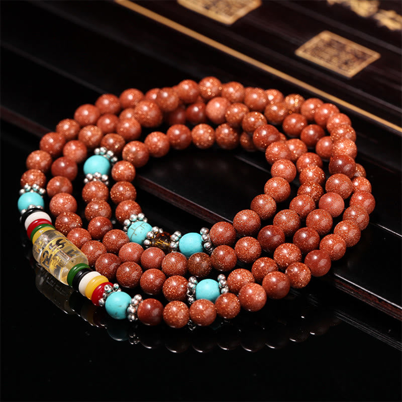 Bracelet de confiance avec 108 perles Mala en Buddha Stones Goldstone Om Mani Padme Hum Swastika