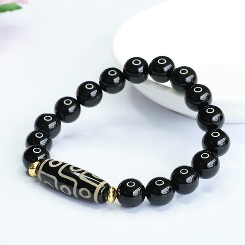 Bracelet de puissance tibétain en onyx noir avec perles dzi à neuf yeux et Buddha Stones