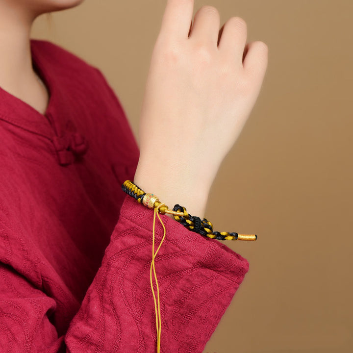 Bracelet en corde écailles de dragon tibétain en or noir fait main avec Buddha Stones Om Mani Padme Hum Pureté