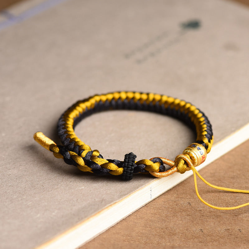 Bracelet en corde écailles de dragon tibétain en or noir fait main avec Buddha Stones Om Mani Padme Hum Pureté
