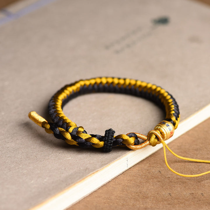 Bracelet en corde écailles de dragon tibétain en or noir fait main avec Buddha Stones Om Mani Padme Hum Pureté