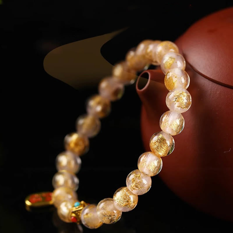 Bracelet porte-bonheur en perles de verre Liuli avec encens tibétain en Buddha Stones et personnage Fu