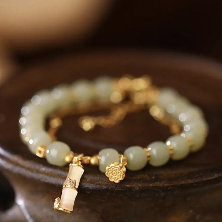 Bracelet à breloques en bambou et lotus en jade Hetian naturel avec Buddha Stones