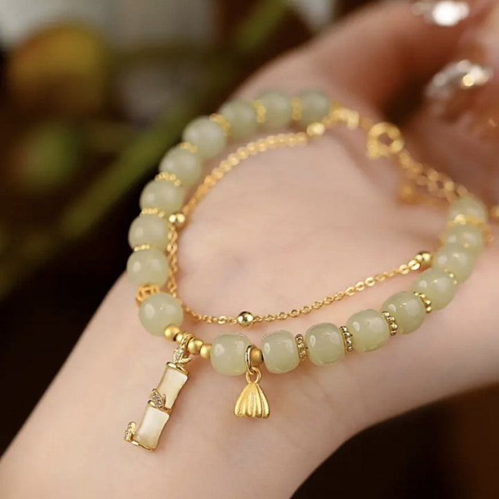 Bracelet à breloques en bambou et lotus en jade Hetian naturel avec Buddha Stones