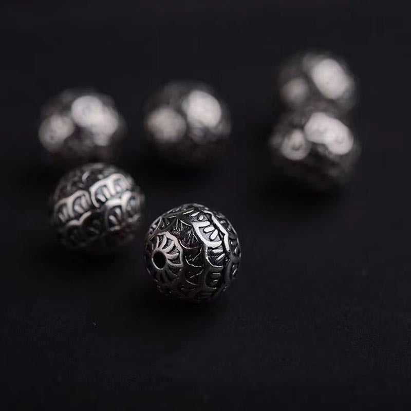 Bracelet de guérison en perles de pierre de lave et écailles de poisson en Buddha Stones