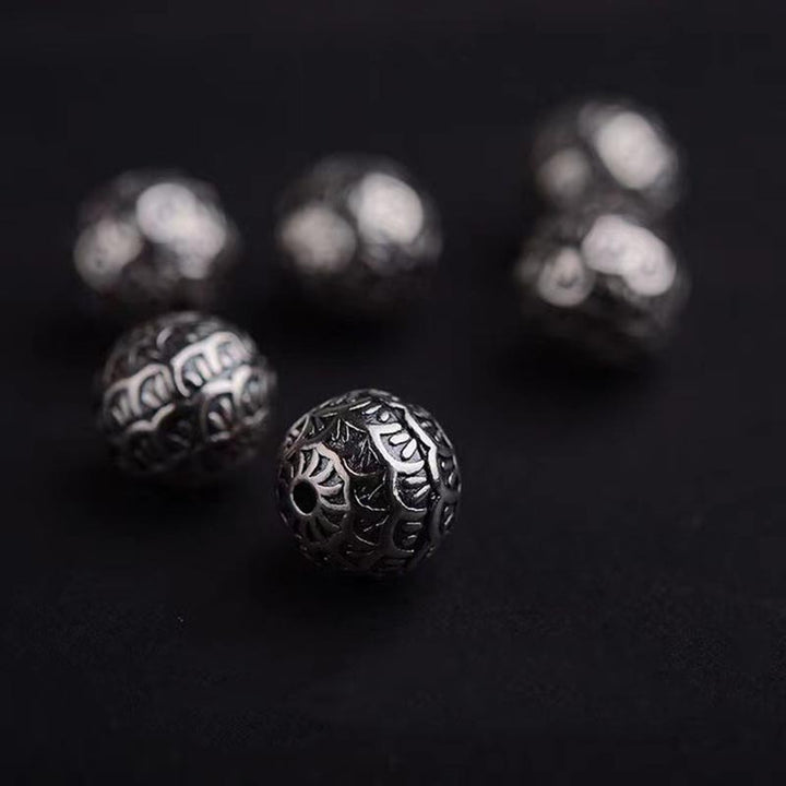 Bracelet de guérison en perles de pierre de lave et écailles de poisson en Buddha Stones