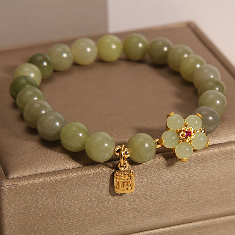 Bracelet porte-bonheur avec breloque en jade vert et fleur de Buddha Stones - image 6