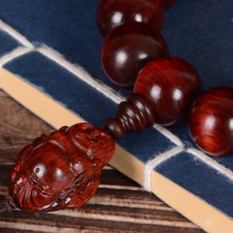 Bracelet Buddha Stones rieur Dieu de la richesse et de la protection en petites feuilles de santal rouge
