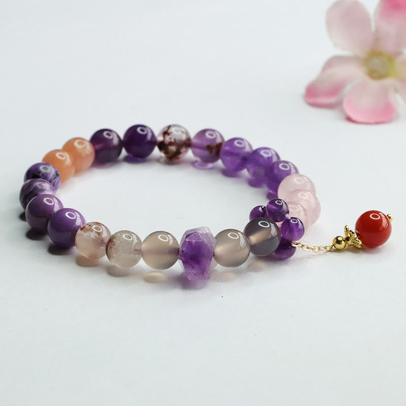 Bracelet à breloques en perles de guérison pour la paix intérieure en cristal d'améthyste naturelle de Buddha Stones