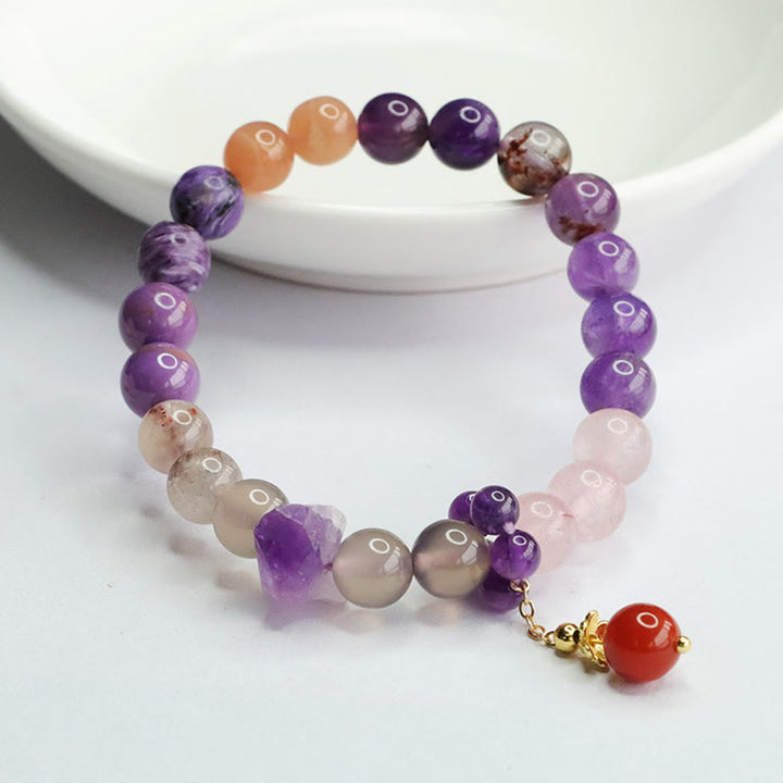Bracelet à breloques en perles de guérison pour la paix intérieure en cristal d'améthyste naturelle de Buddha Stones