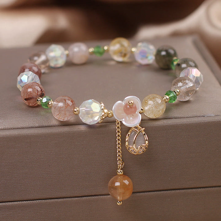 Bracelet de guérison en quartz fraise, quartz rutile, fluorite et fleur de lotus Buddha Stones