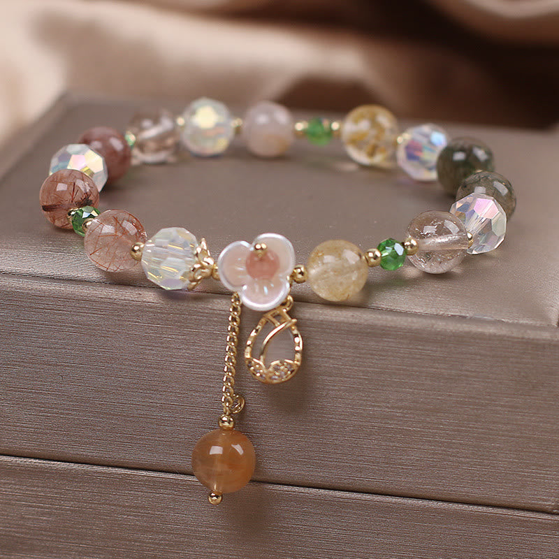 Bracelet de guérison en quartz fraise, quartz rutile, fluorite et fleur de lotus Buddha Stones