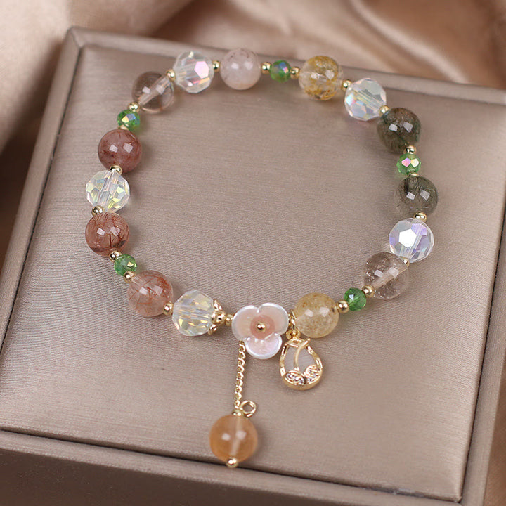 Bracelet de guérison en quartz fraise, quartz rutile, fluorite et fleur de lotus Buddha Stones