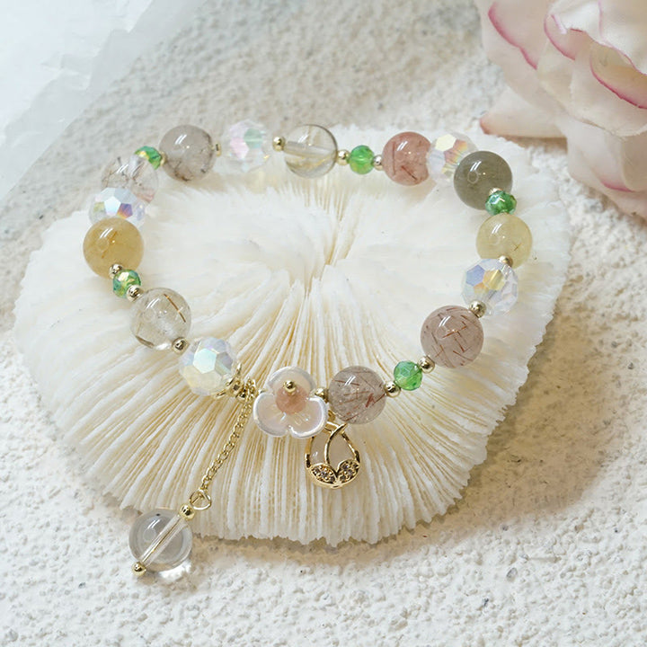 Bracelet de guérison en quartz fraise, quartz rutile, fluorite et fleur de lotus Buddha Stones
