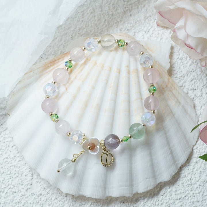 Bracelet de guérison en quartz fraise, quartz rutile, fluorite et fleur de lotus Buddha Stones