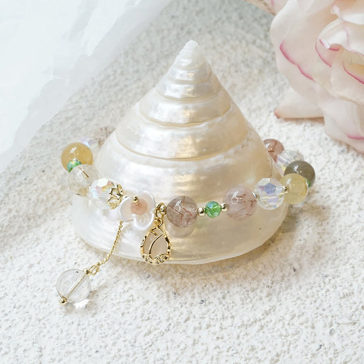 Bracelet de guérison en quartz fraise, quartz rutile, fluorite et fleur de lotus Buddha Stones