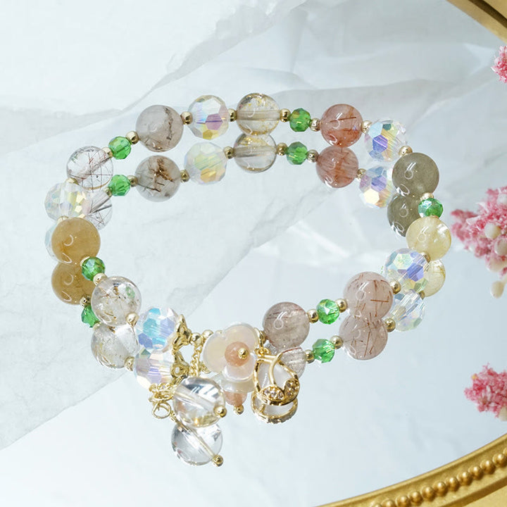 Bracelet de guérison en quartz fraise, quartz rutile, fluorite et fleur de lotus Buddha Stones