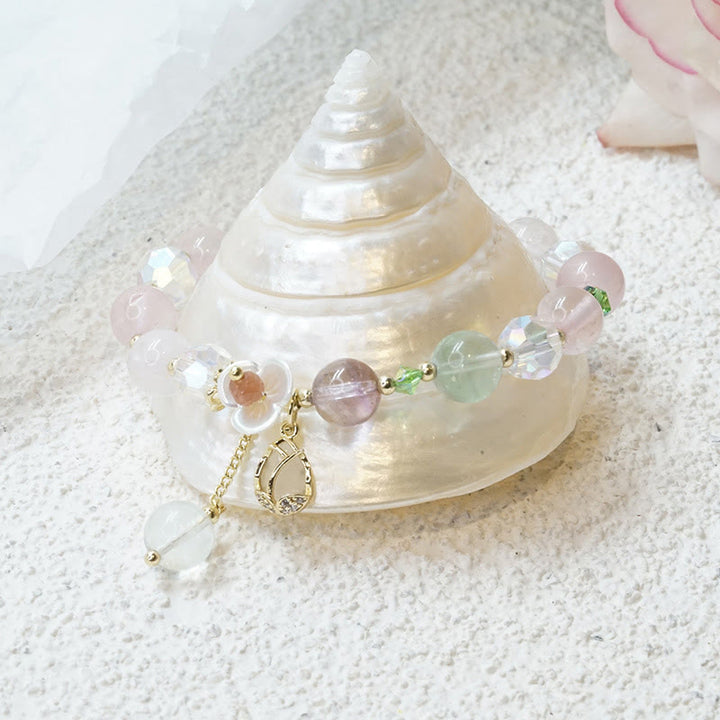 Bracelet de guérison en quartz fraise, quartz rutile, fluorite et fleur de lotus Buddha Stones