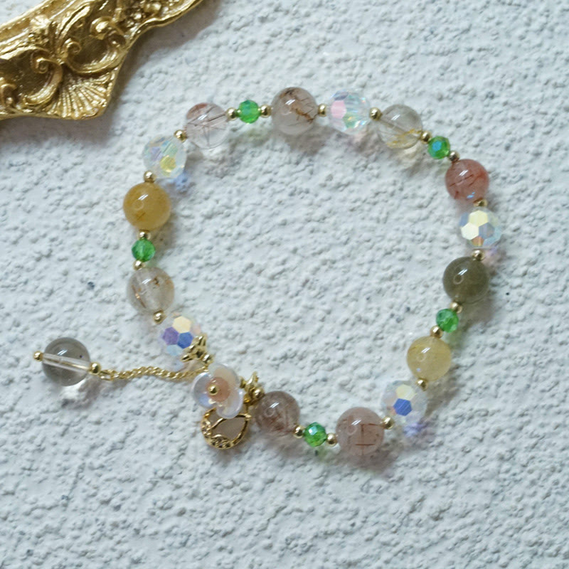 Bracelet de guérison en quartz fraise, quartz rutile, fluorite et fleur de lotus Buddha Stones