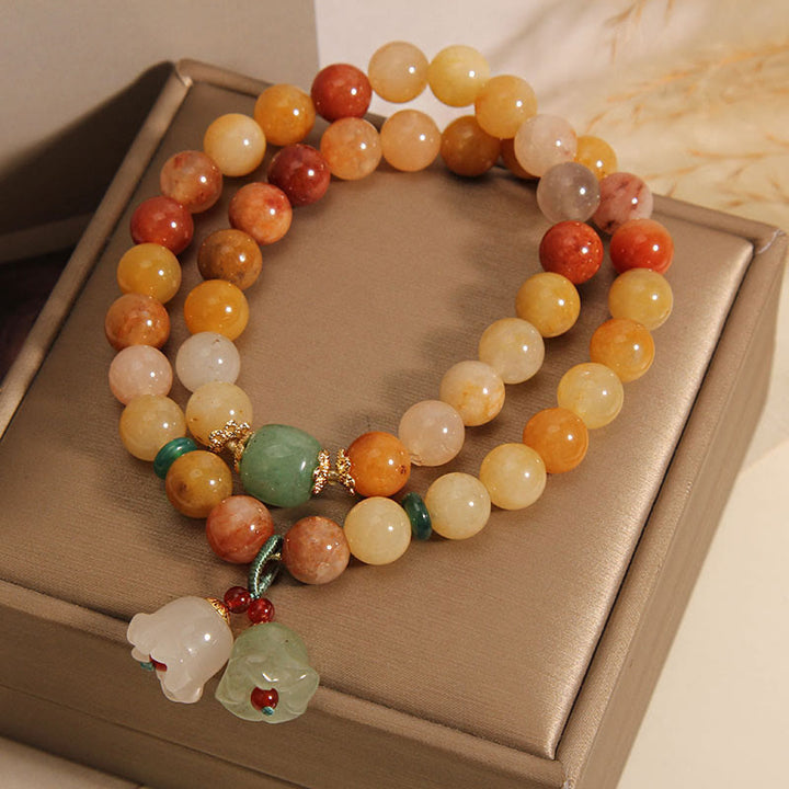 Bracelet porte-bonheur double couche en jade doré naturel et Buddha Stones en pierres du Tibet