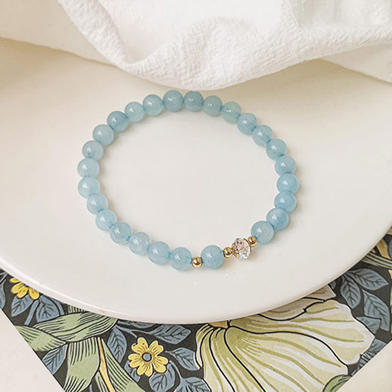 Bracelet de guérison en cuivre plaqué or 14 Buddha Stones avec aigue-marine, cristal blanc, agate blanche et cristal bleu