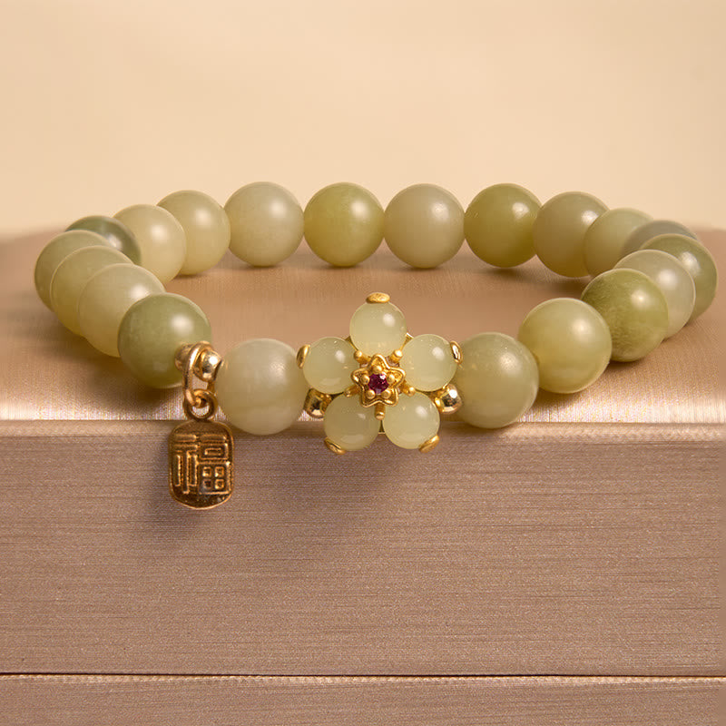 Bracelet porte-bonheur avec breloque en jade vert et fleur de Buddha Stones - image 2