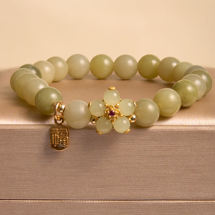 Bracelet porte-bonheur avec breloque en jade vert et fleur de Buddha Stones - image 2