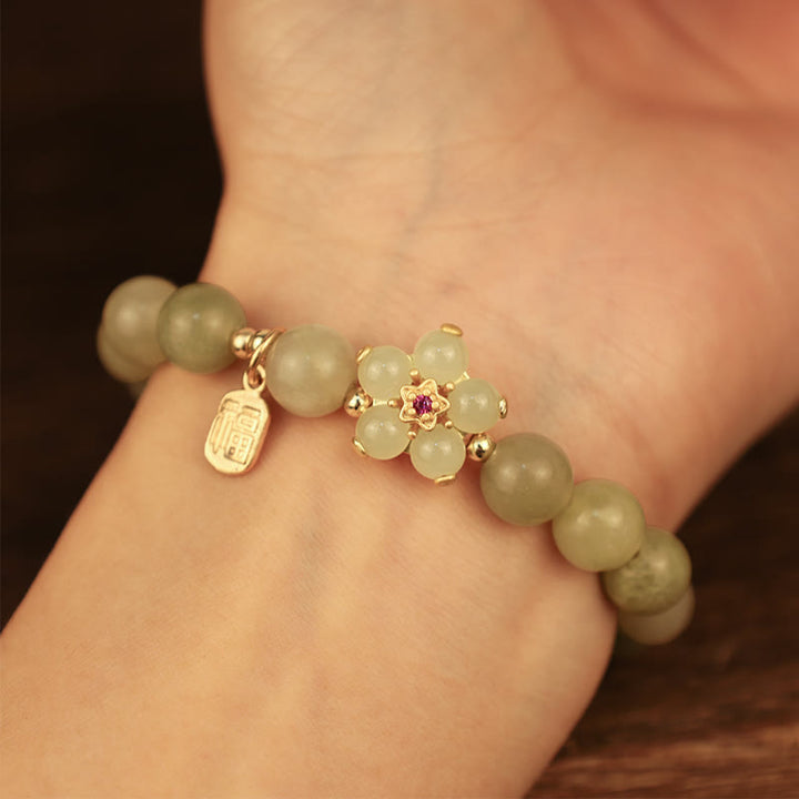 Bracelet porte-bonheur avec breloque en jade vert et fleur de Buddha Stones - image 3