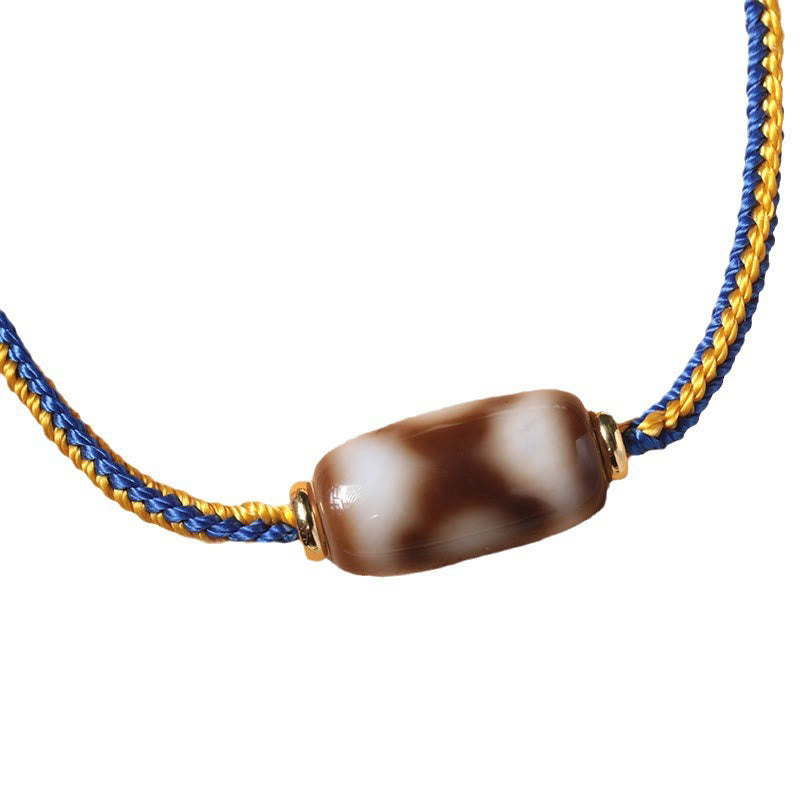 Bracelet tibétain en perles dzi à trois yeux avec Buddha Stones