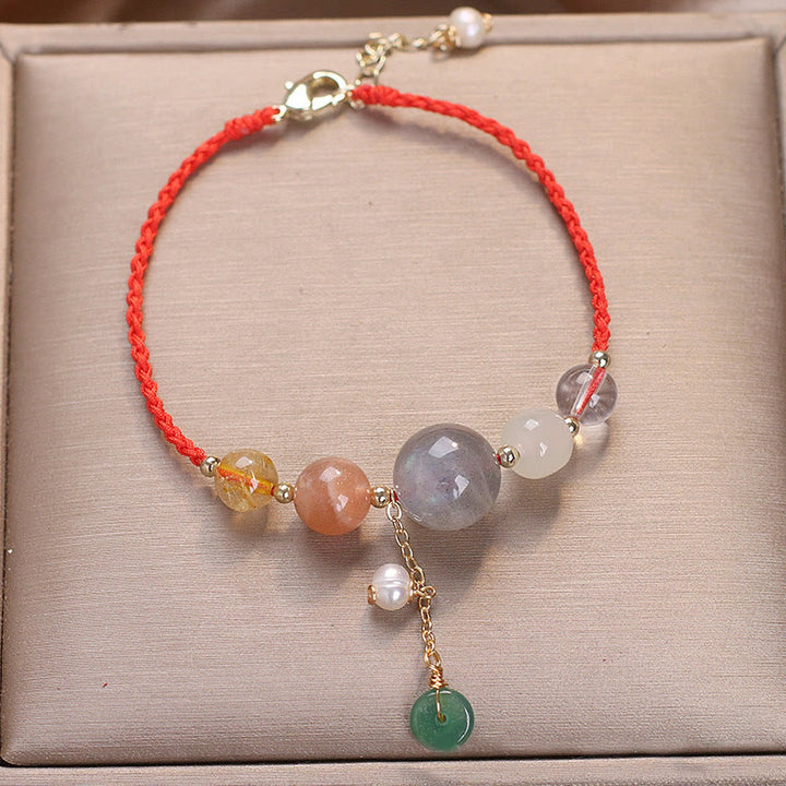 Bracelet de guérison avec breloque en pierre de lune et pierre de soleil et Buddha Stones