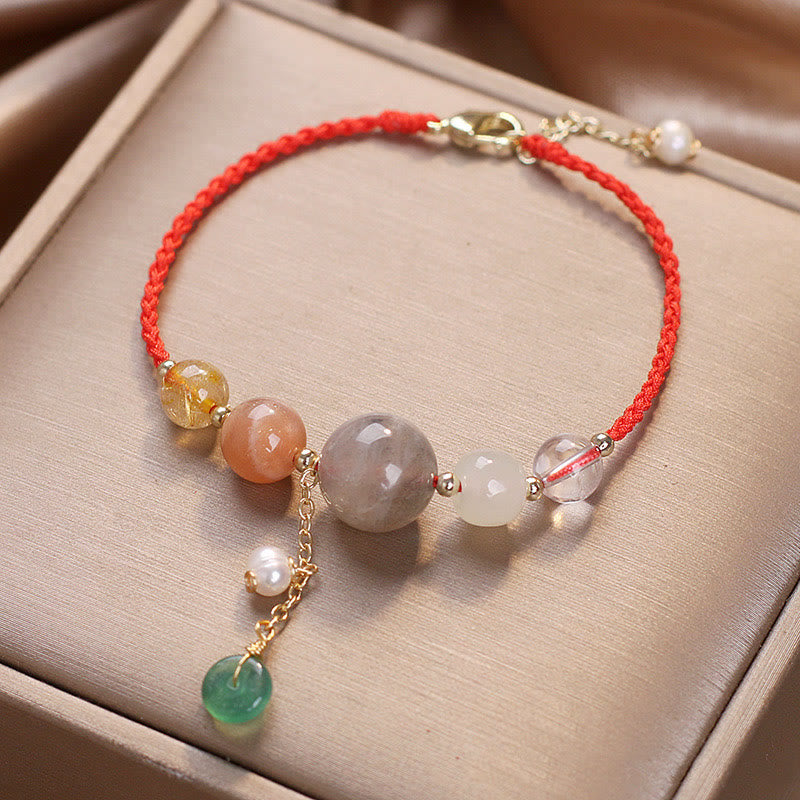 Bracelet de guérison avec breloque en pierre de lune et pierre de soleil et Buddha Stones