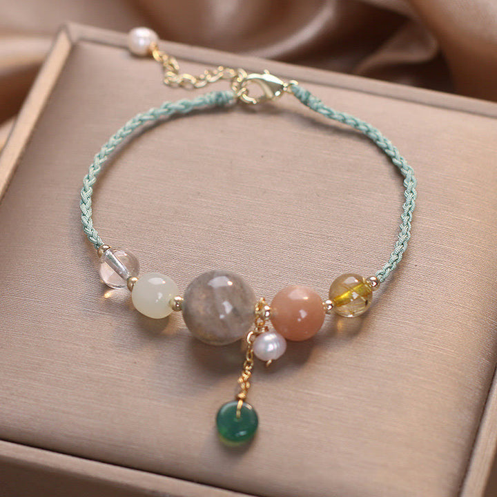 Bracelet de guérison avec breloque en pierre de lune et pierre de soleil et Buddha Stones