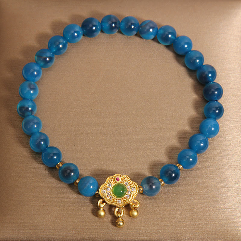 Bracelet de guérison à breloques en agate bleue Buddha Stones