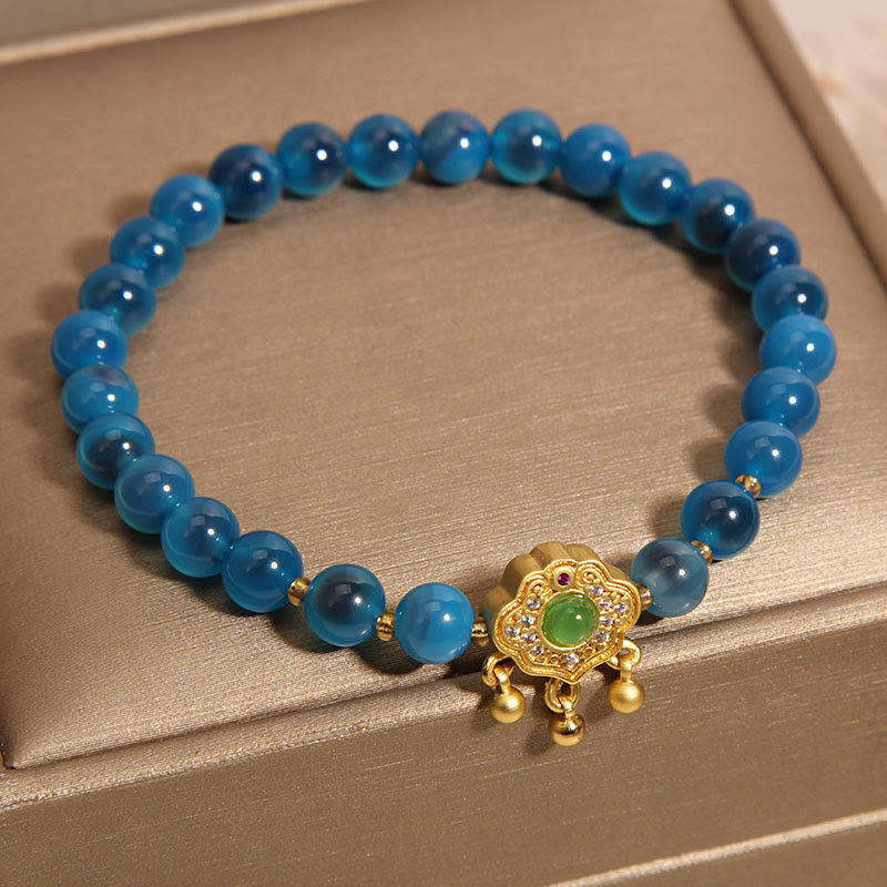 Bracelet de guérison à breloques en agate bleue Buddha Stones