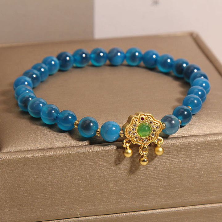 Bracelet de guérison à breloques en agate bleue Buddha Stones