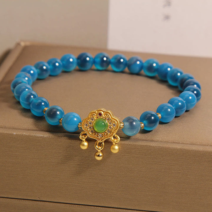 Bracelet de guérison à breloques en agate bleue Buddha Stones