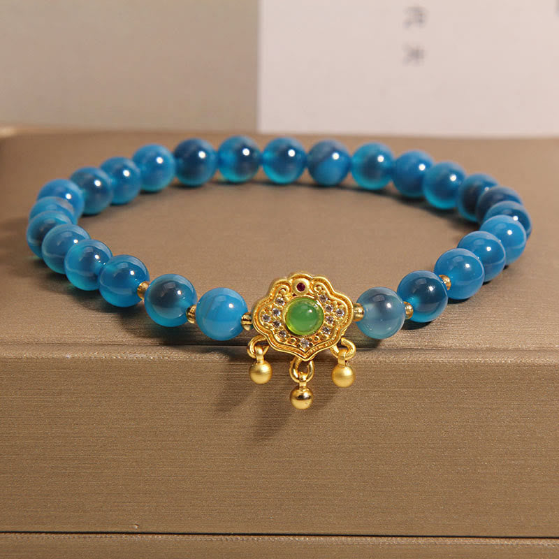 Bracelet de guérison à breloques en agate bleue Buddha Stones