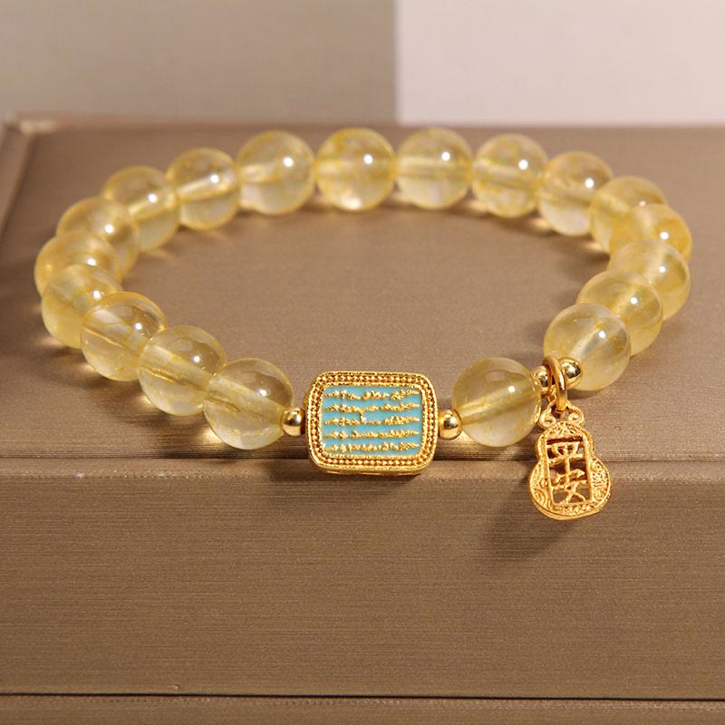 Bracelet de générosité en citrine naturelle et cinq écritures de Buddha Stones