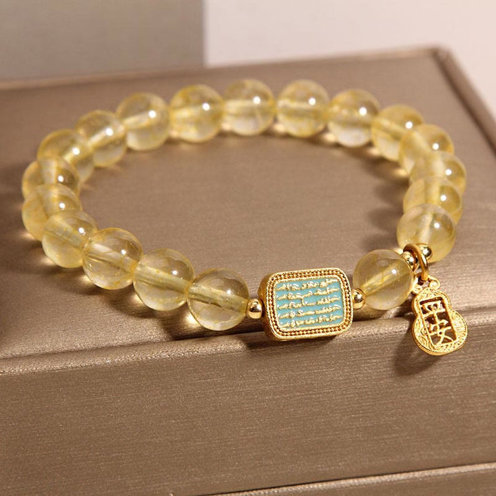 Bracelet de générosité en citrine naturelle et cinq écritures de Buddha Stones